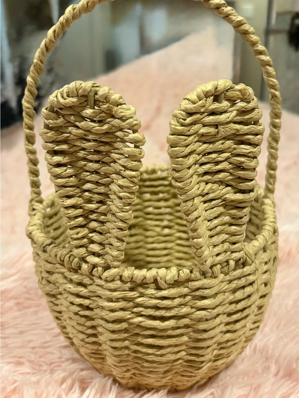 Homemade woven wicker and rattan bunny ear baskets.